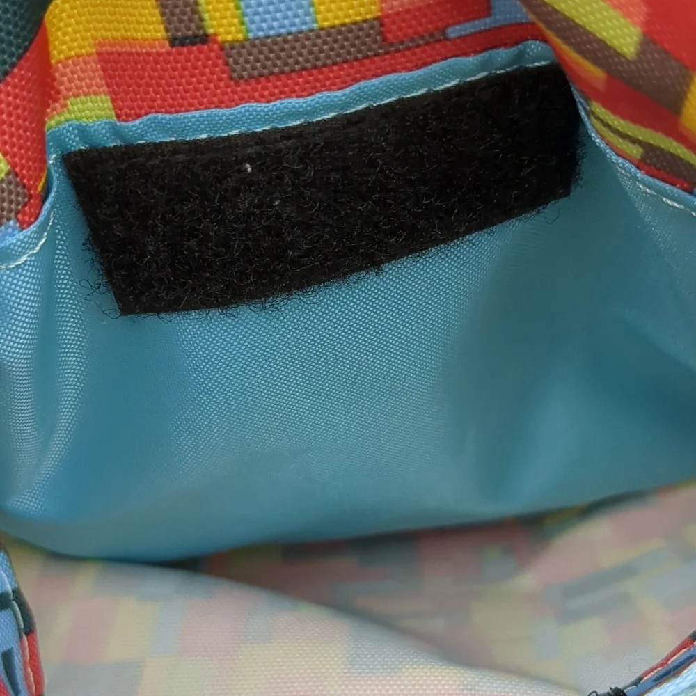 Kavu Keeper Crossbody Bag Geometric Teal Yellow Red